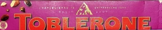 TOBLERONE čokoláda 100g MLÉČNÁ s rozinkami a mandlovým nugátem